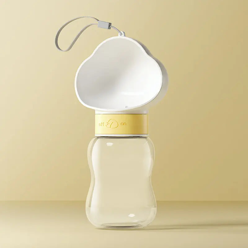 Portable Nick's Super Store pet water bottle with integrated drinking dish for easy hydration on the go.