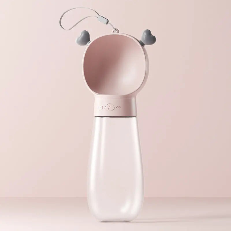 Portable pet water bottle from Nick's Super Store showing a compact, travel-friendly dog and cat water dispenser with a spill-proof design.