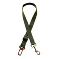 Adjustable pet car seat belt for cats and dogs, made by Nick's Super Store, securely attaching to vehicle for safe travel.