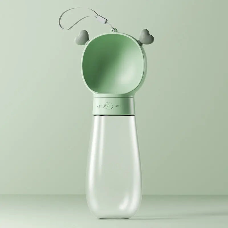 Portable pet water bottle from Nick's Super Store showing a compact, leak-proof design with a built-in water dish for pets.