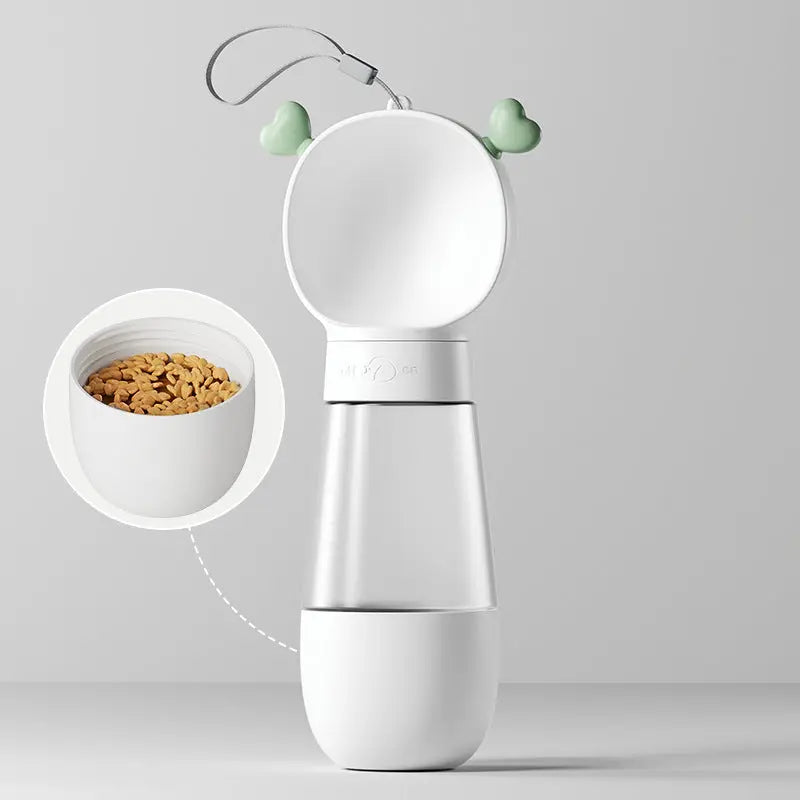 Portable pet water bottle by Nick's Super Store with a built-in drinking tray for easy hydration on the go.