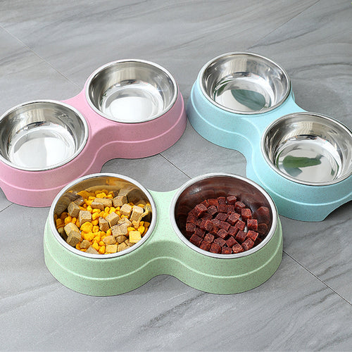 Double stainless steel pet bowl with two compartments for food and water, ideal for pets, featuring a sleek, durable design.