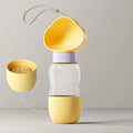 Portable pet water bottle from Nick's Super Store showing a compact water container designed for pets during outdoor activities.