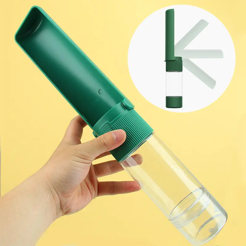 Mini camera from Nick's Super Store with a portable dog water bottle featuring a compact, travel-friendly design and easy-to-use spout.