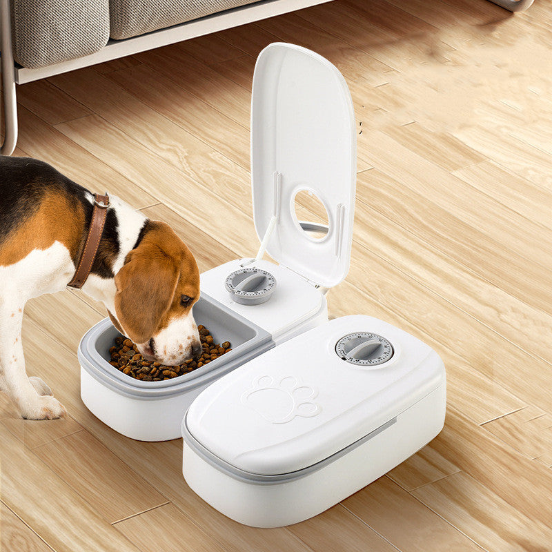 Smart automatic pet feeder from Nick's Super Store, no electricity needed, designed for easy feeding of pets.