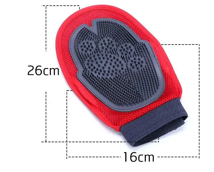 Black dog grooming brush by Nick's Super Store for gentle hair removal and spa-like brushing sessions on soft grain surfaces.