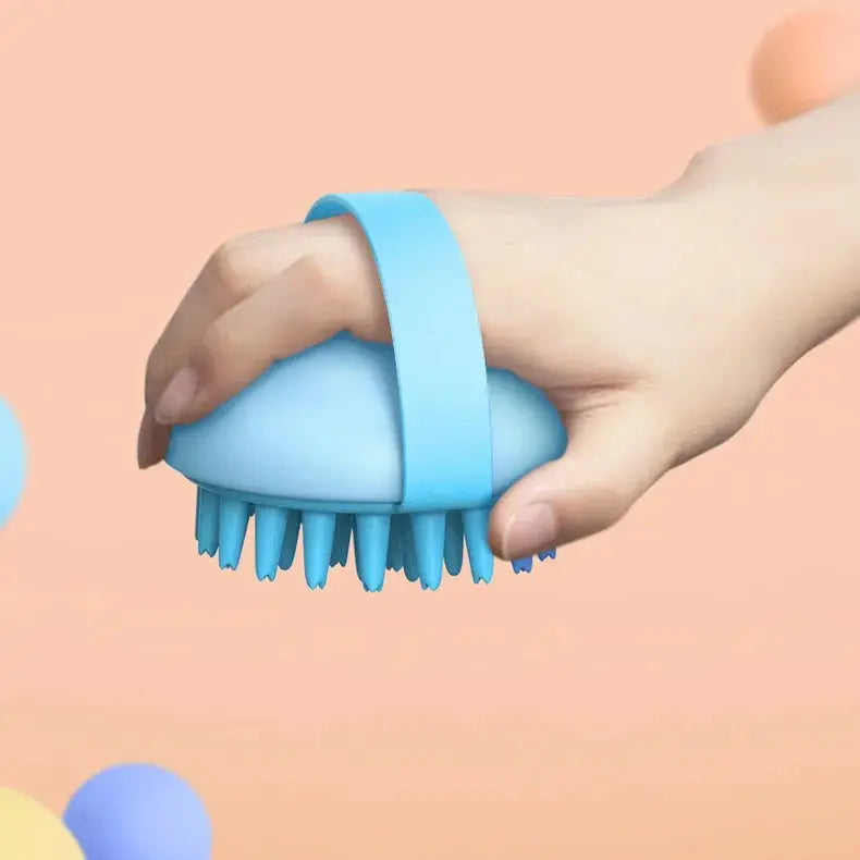 Blue pet silicone bath brush for cats and dogs, gentle massaging grooming tool for soft fur, from Nick's Super Store.