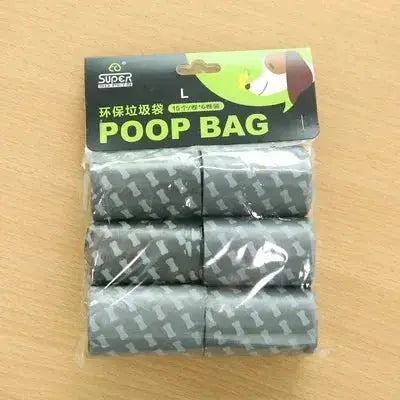 Blue foldable dog pooper scooper from Nick's Super Store with biodegradable bags, designed for easy one-hand cleanup during travel.