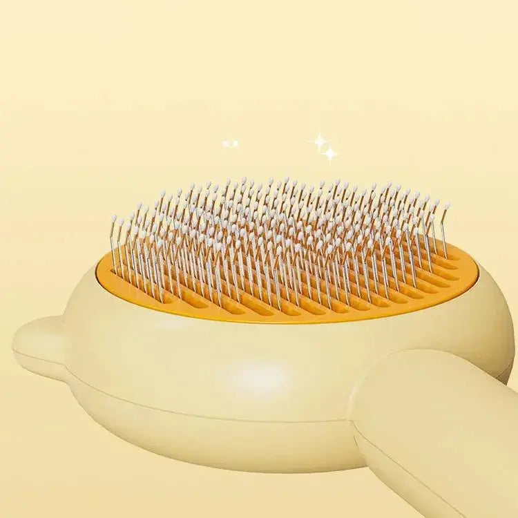 Green cat comb and pet hair removal brush for grooming and cleaning dogs and cats, made of ABS plastic and stainless steel.