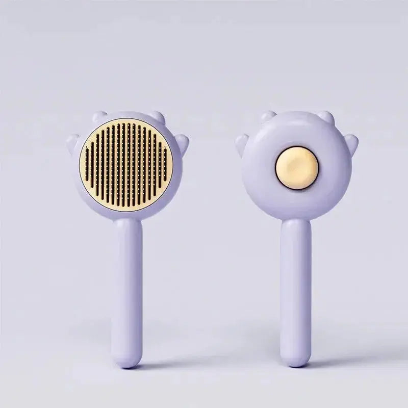 Green pet comb and massage brush for cats and dogs, stainless steel teeth for grooming and hair removal.